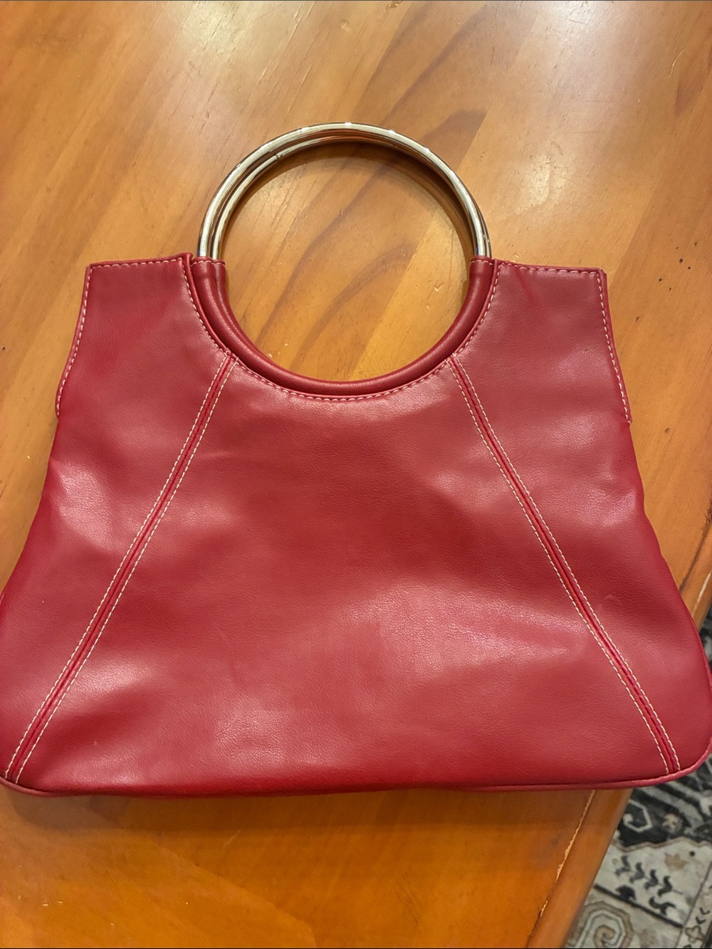 Unlisted Red Circle-Handle Wristlet Bag